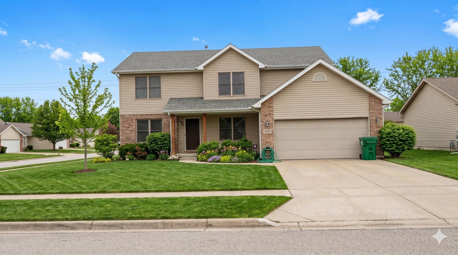 Home exterior after professional editing: blue sky, green lawn, clean driveway